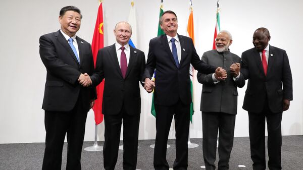 Russia's President Vladimir Putin (2nd L), Brazil's President Jair Bolsonaro (C), India's Prime Minister Narendra Modi (2nd R), China’s President Xi Jinping (L) and South Africa's President Cyril Ramaphosa pose for a picture during the BRICS summit in Osaka, Japan June 28, 2019 - Sputnik International