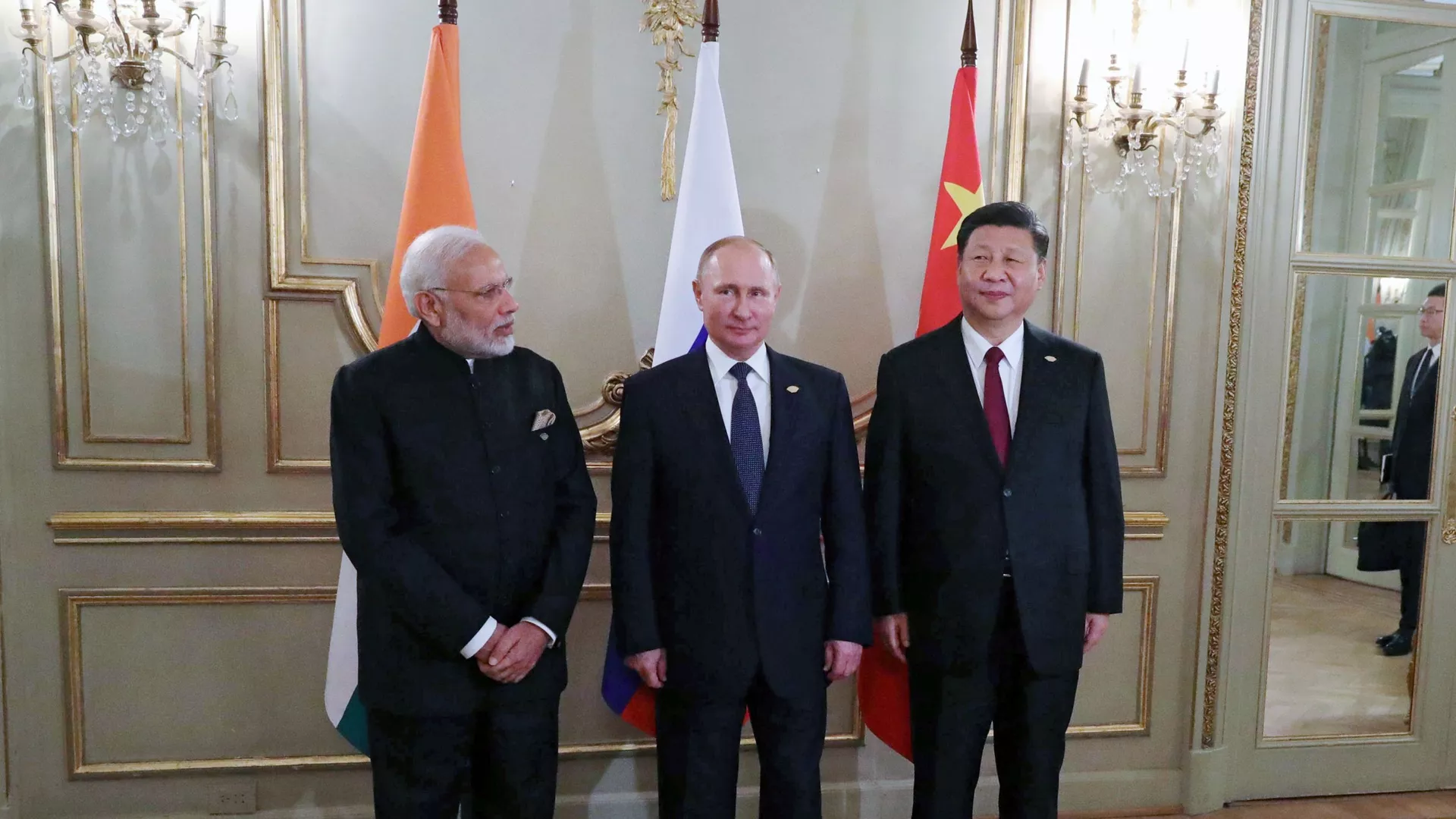 November 30, 2018. President Vladimir Putin, Prime Minister of India Narendra Modi, left, and President of China Xi Jinping, right, during a meeting on the sidelines of the G20 summit in Buenos Aires - Sputnik International, 1920, 31.08.2025
