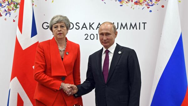 June 28, 2019. The Russian President Vladimir Putin and the prime minister of Great Britain Theresa May during the meeting on the sidelines of the summit in Osaka - Sputnik International