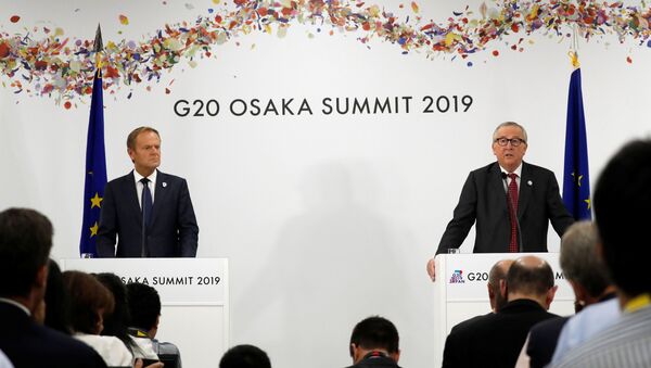 European Commission President Jean-Claude Juncker and European Council President Donald Tusk attend a news conference at the G20 leaders summit in Osaka, Japan, 28 June 2019 - Sputnik International