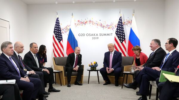 Delegations, led by Russia's President Vladimir Putin and U.S. President Donald Trump, hold talks on the sidelines of the G20 summit in Osaka, Japan June 28, 2019 - Sputnik International