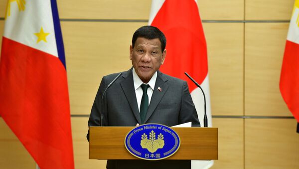 Philippine President Rodrigo Duterte delivers a speech during their joint press statement with Japan's Prime Minister Shinzo Abe (not pictured) at Abe's official residence in Tokyo, Japan May 31, 2019 - Sputnik International