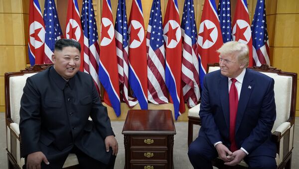 U.S. President Donald Trump meets with North Korean leader Kim Jong Un at the demilitarized zone separating the two Koreas, in Panmunjom, South Korea, June 30, 2019.  - Sputnik International