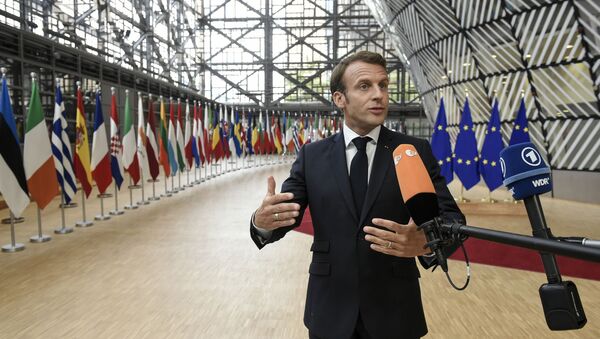 France's President Emmanuel Macron speaks to the press as he arrives for an European Council Summit at The Europa Building in Brussels, on June 30, 2019 - Sputnik International