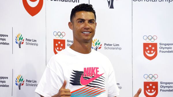 Portuguese soccer player Cristiano Ronaldo is seen during a visit to Yumin Primary School in Singapore, July 4, 2019 - Sputnik International