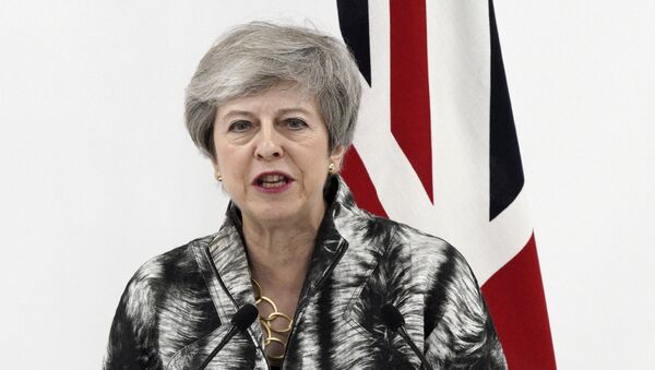 British Prime Minister Theresa May speaks during a press conference after the G-20 summit in Osaka, western Japan Saturday, 29 June 2019 - Sputnik International