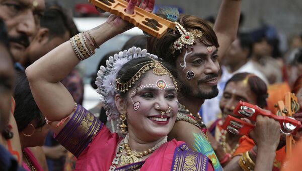 Indian Hindu devotees participate in the annual festival of Rath Yatra, or chariot procession, in Ahmadabad, India, Thursday, July 4, 2019 - Sputnik International
