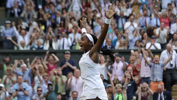 United States' Cori Coco Gauff celebrates after beating Slovenia's Polona Hercog in a Women's singles match during day five of the Wimbledon Tennis Championships in London, Friday, July 5, 2019 - Sputnik International