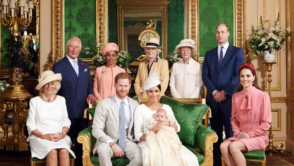 This official christening photograph released by the Duke and Duchess shows Prince Harry, Duke of Sussex and Meghan, Duchess of Sussex with their son, Archie and the Duchess of Cornwall, Britain's Prince Charles, Prince of Wales, Ms Doria Ragland, Lady Jane Fellowes, Lady Sarah McCorquodale, Prince William, Duke of Cambridge and Catherine, Duchess of Cambridge in the Green Drawing Room at Windsor Castle, near London, Britain July 6, 2019.  - Sputnik International