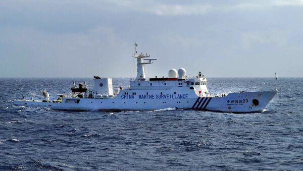 This handout picture taken by the Japan Coast Guard on January 19, 2013 shows a Chinese Marine Surveillance ship cruising inside waters around the disputed islands known as the Senkaku islands in Japan and the Diaoyu islands in China, in the East China Sea. - Sputnik International