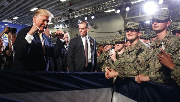 President Donald Trump greets troops after speaking at a Memorial Day event aboard the USS Wasp in Yokosuka, Japan - Sputnik International