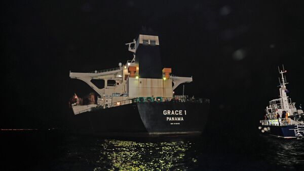 Oil supertanker Grace 1, that's on suspicion of carrying Iranian crude oil to Syria, is seen in waters of the British overseas territory of Gibraltar, historically claimed by Spain, July 4, 2019 - Sputnik International