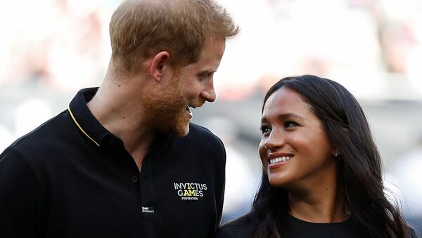 Britain's Prince Harry and Meghan, Duchess of Sussex attend the Boston Red Sox v New York Yankees match in London, Britain June 29, 2019 - Sputnik International