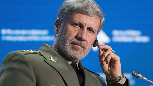 Iranian Defense Minister Amir Hatami listens during the Conference on International Security in Moscow, Russia, Wednesday, April 4, 2018 - Sputnik International