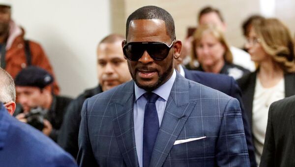 Grammy-winning R&B singer R. Kelly arrives for a child support hearing at a Cook County courthouse in Chicago, Illinois, U.S. March 6, 2019 - Sputnik International