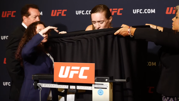 Screengrab of video showing UFC fighter Aspen Ladd as she is weighed ahead of a fight. - Sputnik International