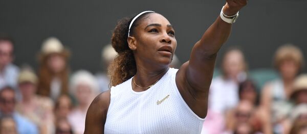 US player Serena Williams serves against Romania's Simona Halep during their women's singles final on day twelve of the 2019 Wimbledon Championships - Sputnik International