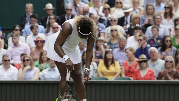 United States' Serena Williams is dejected after losing a point during the women's singles final match against Romania's Simona Halep on day twelve of the Wimbledon Tennis Championships in London, Saturday, July 13, 2019. - Sputnik International