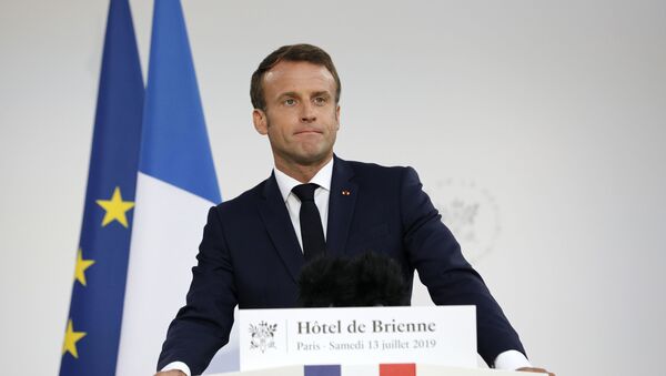 French President Emmanuel Macron delivers a speech at the residence of French Defense Ministry on the eve of Bastille Day, on July 13, 2019, in Paris. - Sputnik International
