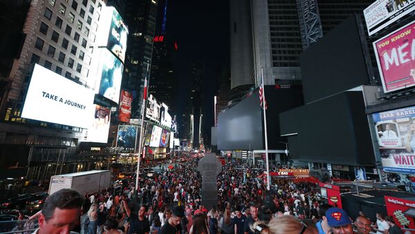 Screens in Times Square are black during a power outage, Saturday, July 13, 2019, in New York.  - Sputnik International