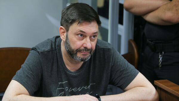RIA Novosti Ukraine news portal head Kirill Vyshinsky reacts in the court room in Kiev, Ukraine - Sputnik International