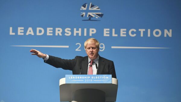 Conservative Party leadership candidate Boris Johnson, gestures, during a Conservative Party leadership hustings in Cheltenham, England, Friday July 12, 2019 - Sputnik International