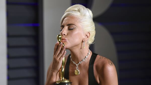 Lady Gaga kisses her Oscar for best original song at the Vanity Fair Oscar Party on Sunday, Feb. 24, 2019, in Beverly Hills, Calif - Sputnik International
