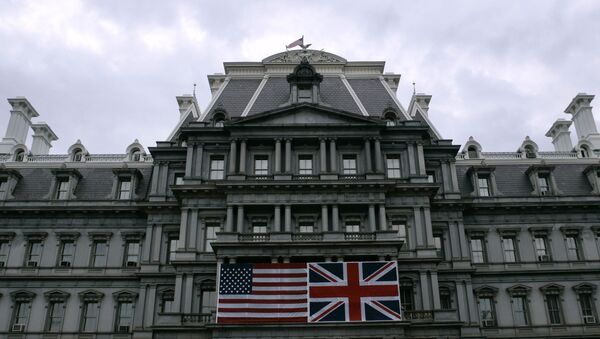 Flags of the United States and the United Kingdom are displayed in front of the Old Executive Office Building - Sputnik International