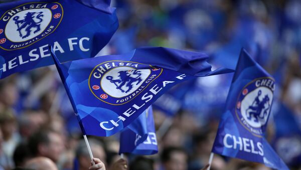 Cheslea supporters wave flags in the crowd ahead of the English FA Community Shield football match between Arsenal and Chelsea at Wembley Stadium - Sputnik International