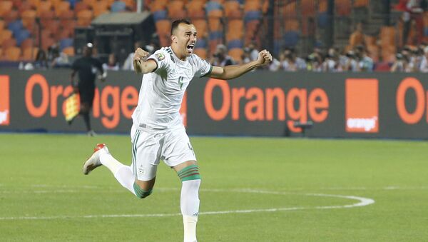 Algeria's Djamel Eddine celebrates a goal during the African Cup of Nations final soccer match between Algeria and Senegal - Sputnik International