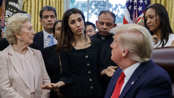 President Donald Trump listens to Nobel Peace Prize winner Nadia Murad, a Yazidi from Iraq, center, as he meets with survivors of religious persecution in the Oval Office of the White House on Wednesday, July 17, 2019, in Washington. - Sputnik International