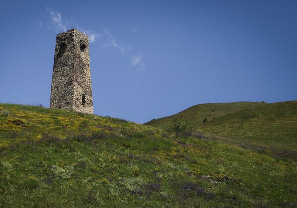 An ancient tower is pictured near the City of the Dead, a medieval Alanian burial site and a local branch of the North Ossetian National Museum near the village of Dargavs, Russia's Republic of North Ossetia - Alania. - Sputnik International