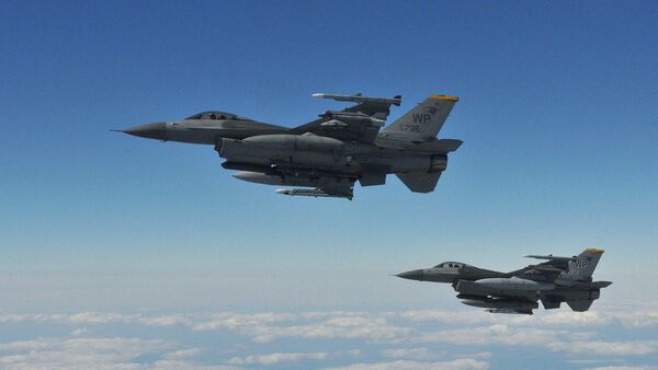 Two F-16 Fighting Falcons pilots with the 8th Fighter Wing's 80th Fighter Squadron, Kunsan Air Base, Republic of Korea - Sputnik International