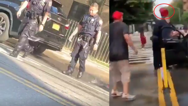 NYPD Officers seen soaked after civilians douse them with water over the weekend of 7/19-7/23 - Sputnik International
