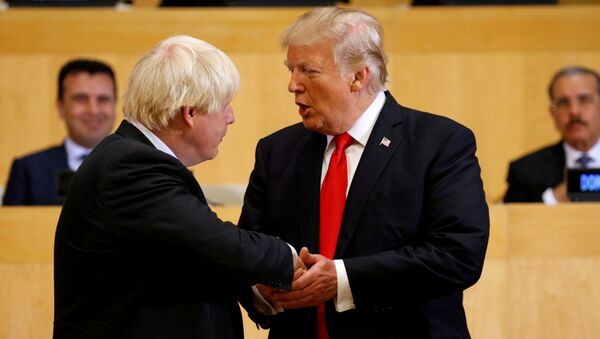 U.S. President Donald Trump shakes hands with British Foreign Secretary Boris Johnson as they take part in a session on reforming the United Nations at U.N. Headquarters in New York - Sputnik International