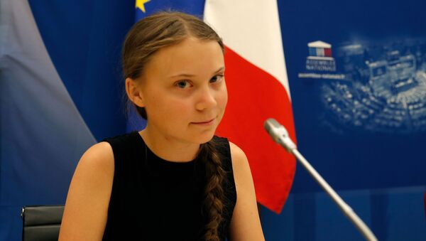 Swedish environmental activist Greta Thunberg attends a debate with French parliament members at the National Assembly in Paris, France, July 23, 2019 - Sputnik International