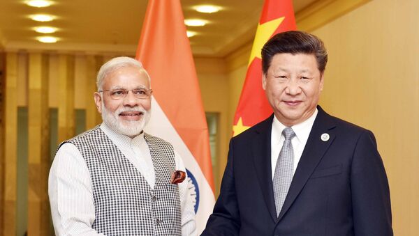 PM Modi with Chinese President Xi Jinping - Sputnik International