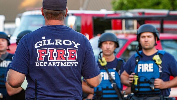 Emergency personnel work at the scene of a mass shooting during the Gilroy Garlic Festival in Gilroy, California, U.S. July 28, 2019 - Sputnik International