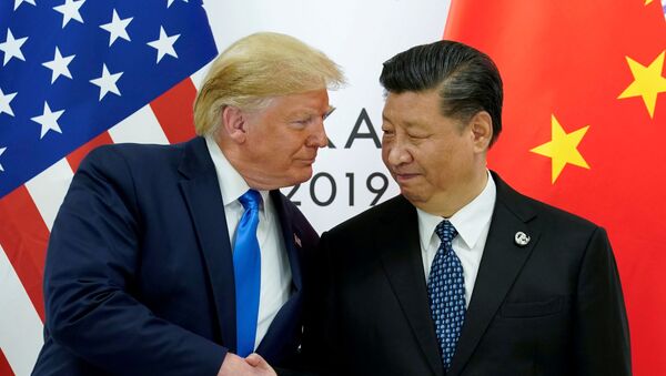 U.S. President Donald Trump meets with China's President Xi Jinping at the start of their bilateral meeting at the G20 leaders summit in Osaka, Japan, June 29, 2019 - Sputnik International