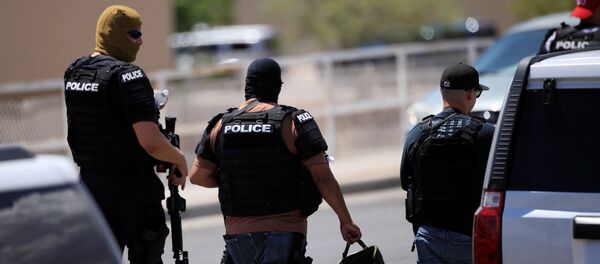 Police arrive after a mass shooting at a Walmart in El Paso, Texas, U.S. August 3, 2019. REUTERS/Jorge Salgado - Sputnik International