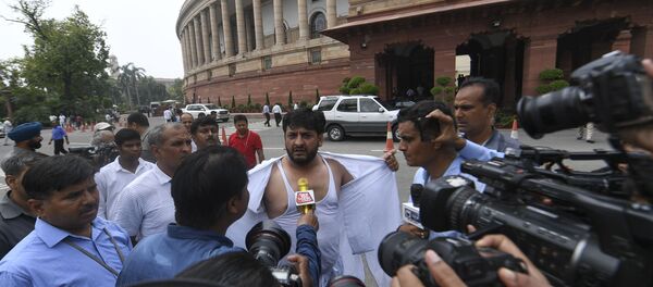 Fayaz Ahmad Mir (C) member of Parliament representing the state of Jammu & Kashmir in Rajya Sabha interact with media at the Parliament house in New Delhi on August 5, 2019 Fayaz Ahmad Mir (C) member of Parliament representing the state of Jammu & Kashmir in Rajya Sabha interact with media at the Parliament house in New Delhi on August 5, 2019 - Sputnik International