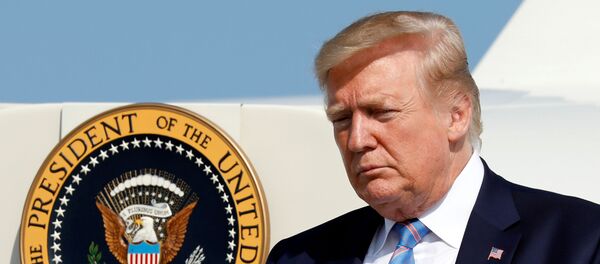 U.S. President Donald Trump arrives at Morristown municipal airport for a weekend at the Trump National Golf Club in Bedminster,  New Jersey, U.S., August 2, 2019 - Sputnik International
