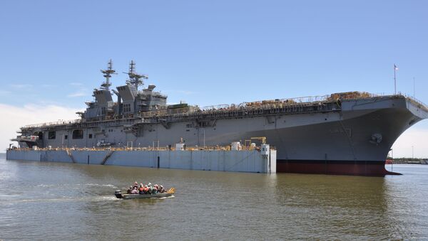 PASCAGOULA, Miss. (May 1, 2017) The future USS Tripoli (LHA 7) is launched at Huntington Ingalls Industries. Tripoli was successfully launched after the dry-dock was flooded to allow it to float off for the first time. Tripoli incorporates an enlarged hangar deck, enhanced maintenance facilities, increased fuel capacity and additional storerooms to provide the fleet with a platform optimized for aviation capabilities. The ship is planned to be christened in 2017 with delivery planned for late 2018 - Sputnik International