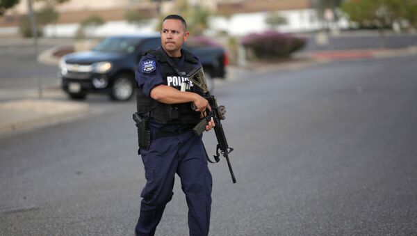 A police officer is seen after a mass shooting at a Walmart in El Paso, Texas, U.S. August 3, 2019. - Sputnik International