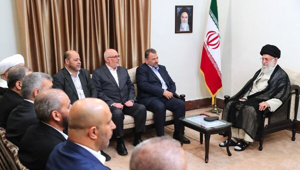 In this photo released by an official website of the office of the Iranian supreme leader, Supreme Leader Ayatollah Ali Khamenei, right, meets Hamas deputy chief, Saleh al-Arouri, second right, and the Hamas delegation, in Tehran, Iran, Monday, July 22, 2019. - Sputnik International