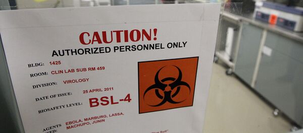 A sign on the door of a Biosafety Level 4 laboratory at the U.S. Army Medical Research Institute of Infectious Diseases in Fort Detrick, Md., Wednesday, Aug. 10, 2011. - Sputnik International