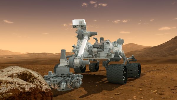This artist's concept features NASA's Mars Science Laboratory Curiosity rover, a mobile robot for investigating Mars' past or present ability to sustain microbial life. Curiosity landed near the Martian equator about 10:31 p.m., Aug. 5 PDT - Sputnik International