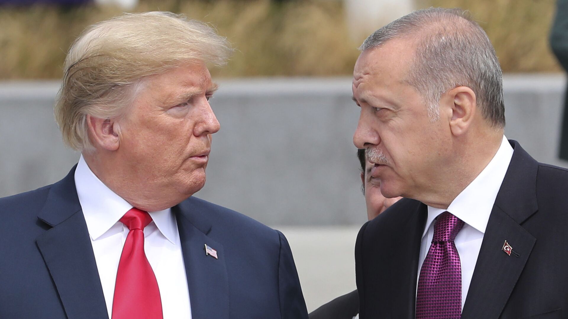 U.S. President Donald Trump, left, talks to Turkish President Recep Tayyip Erdogan, right, as they tour the new NATO headquarters in Brussels, Belgium, Wednesday, July 11, 2018. NATO countries' heads of states and governments gather in Brussels for a two-day meeting.  - Sputnik International, 1920, 05.10.2021