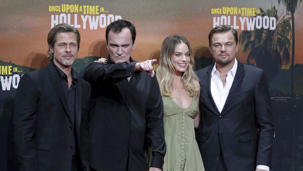 From left, actor Brad Pitt, director Quentin Tarantino, actress Margot Robbie and actor Leonardo DiCaprio pose for the media as they arrive for the Germany premiere of the movie 'Once Upon A Time in Hollywood' in Berlin, Germany, Thursday, Aug. 1, 2019 - Sputnik International