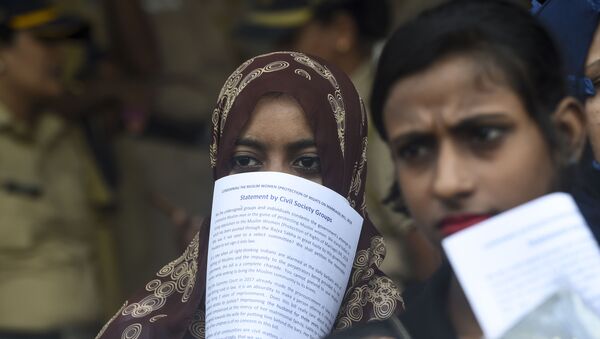 Women take part in a protest against the recent passage of a law to criminalise instant divorce for Muslims in Mumbai on August 1, 2019 - Sputnik International